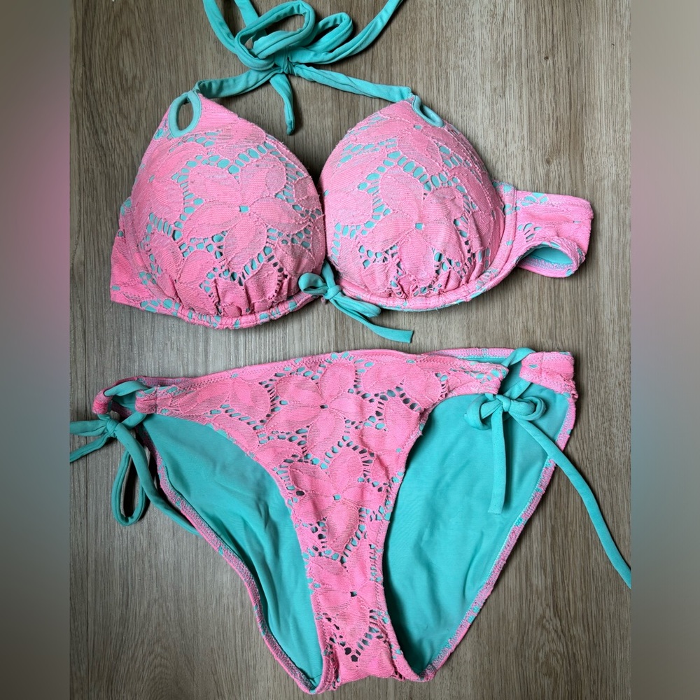Victorias Secret pink and turquoise swim suit.